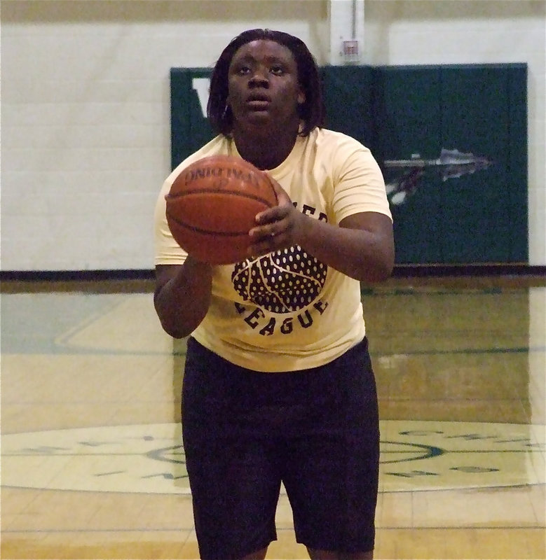 Image: Reed eyes the rim — Jimesha Reed earns a trip to the free throw line in the first half against Corsicana.