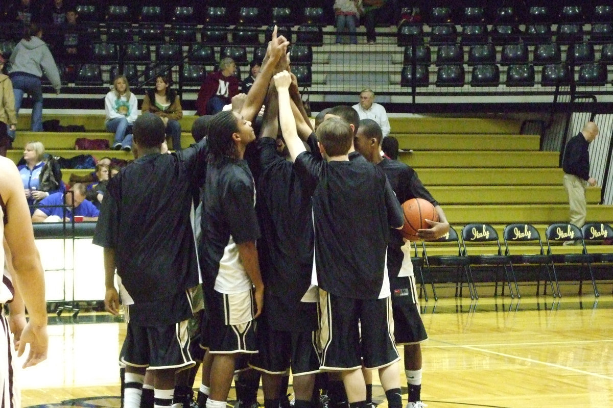 Image: Italy Gladiators United — The italy Gladiators prepare to do battle against the Mildred Eagles in the 1st round of the Italy Invitational tournament. The Gladiators went on to defeat the Eagles 59-56 in overtime.