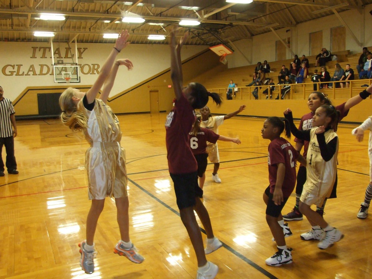 Image: Annie Perry put in 5-points to help her team win 12-6 — Italy’s 3rd and 4th grade girls pull out a victory against Hillsboro inside the old Italy gym on Saturday.