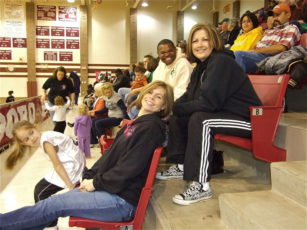 Image: Fans all smiles — Darla Wood, Debra Perry, Bryant Cockran and the DeLaHoya Family are enjoying the games in Hillsboro.