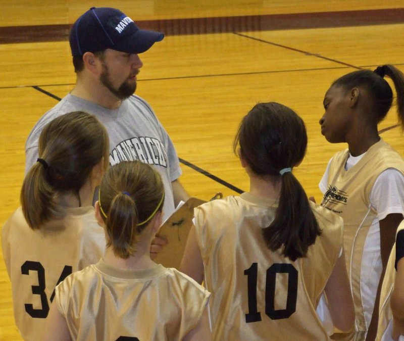 Image: No dunking allowed — “The girls were so nervous before the game but it was exciting to watch them execute parts of our game plan and get the win,” said Coach Barry Byers.