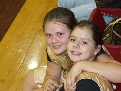 Image: Lillie and Brooke — Lillie Perry and Brooke DeBorde are feeling good about there teams performance during the game.