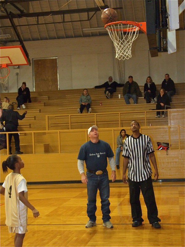 Image: Count it! — Chardonae Talton(4) shoots a layup. A made layup before the game is worth 1-point.