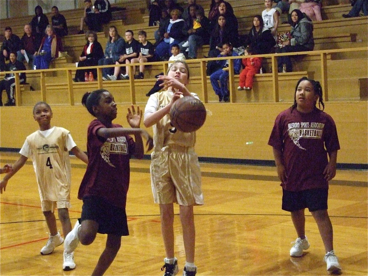 Image: Grace gets fouled — Grace Haight(5) takes the hard foul from Hillsboro.