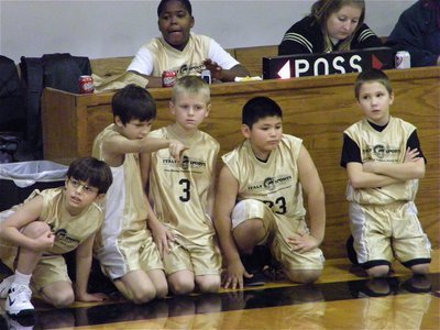 Image: Raring to go — 3rd and 4th graders Michael South(4), Ty Hamilton(11), Ethan Rodgers(3), Alex Garcia (23) and Payton Grant(1) are ready to enter the game.