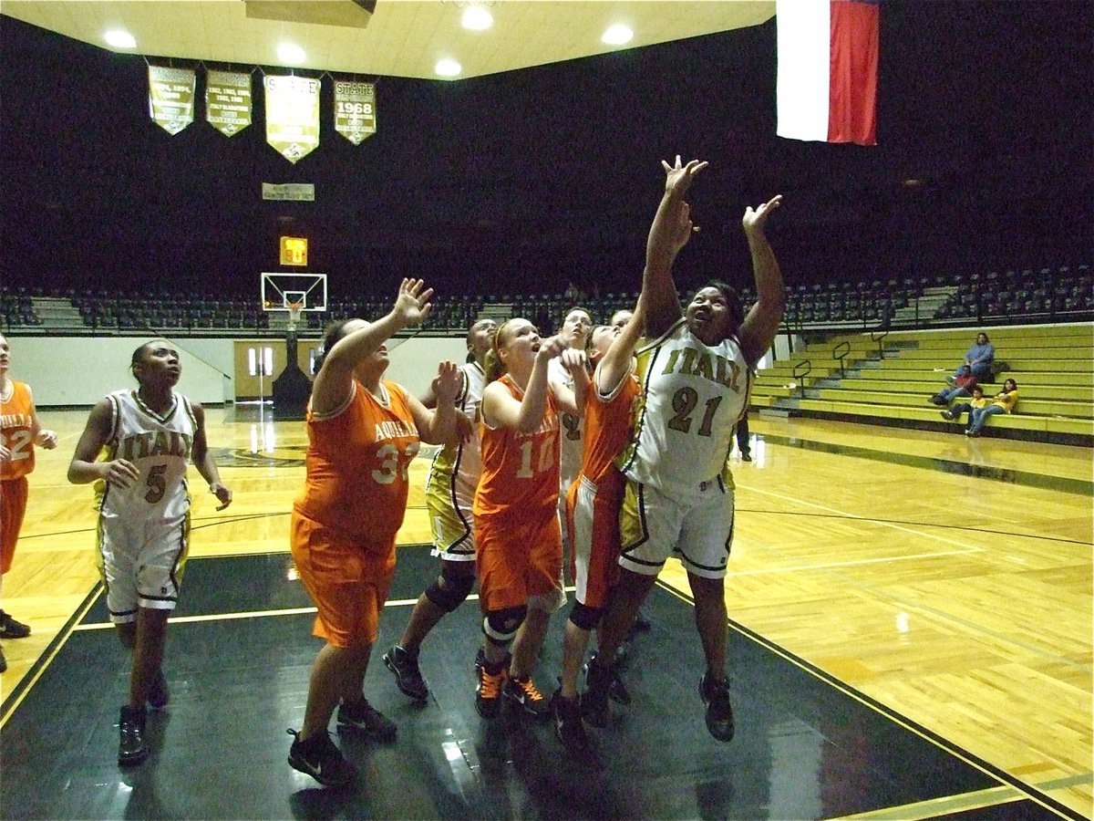 Image: Khadija shoots — Khadija Davis gets the shot up against Aquilla finishing with 4-points in the game.