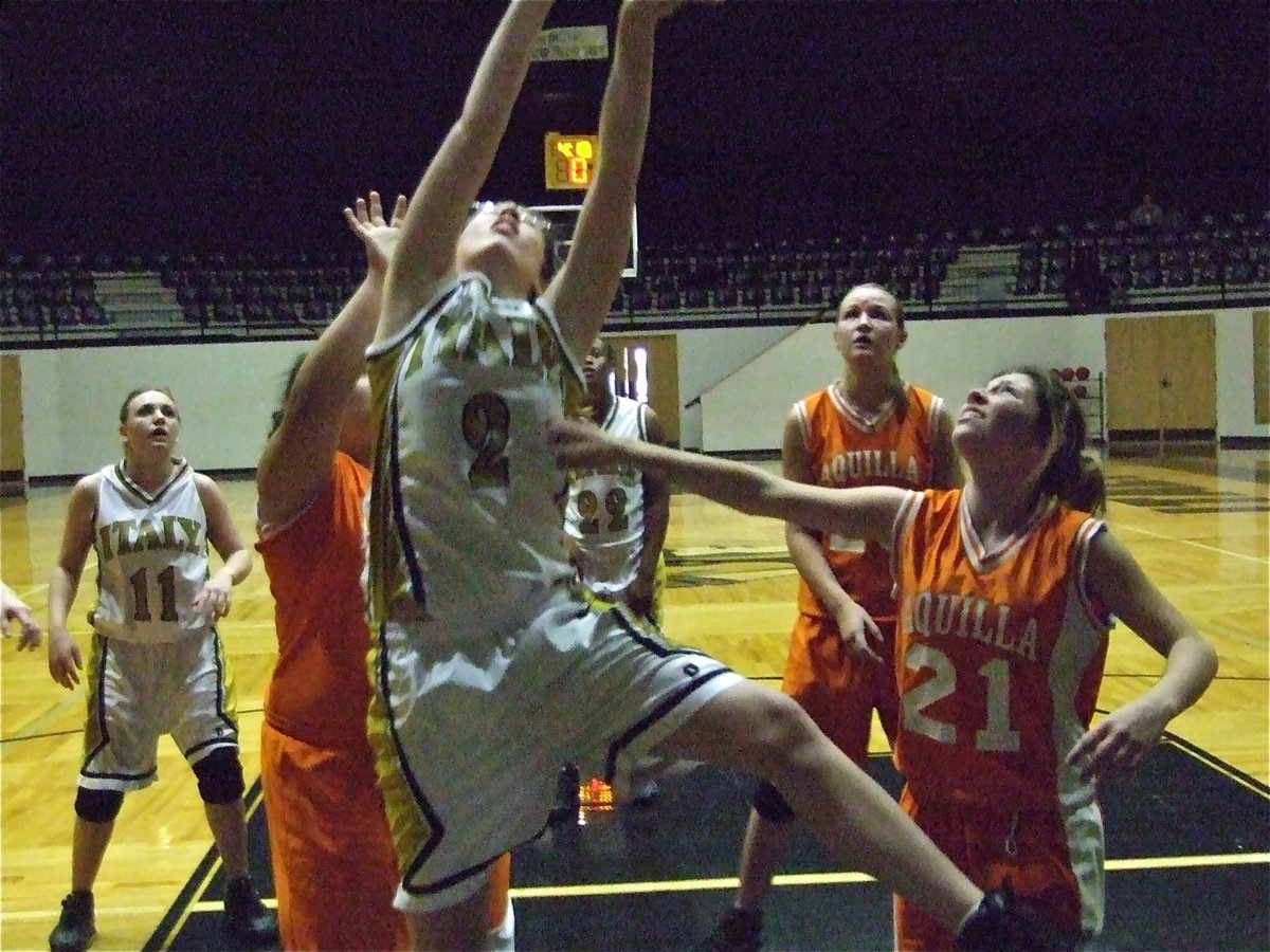 Image: Baugher battles — Danyelle Baugher(2) battles for 2-points against Aquilla.