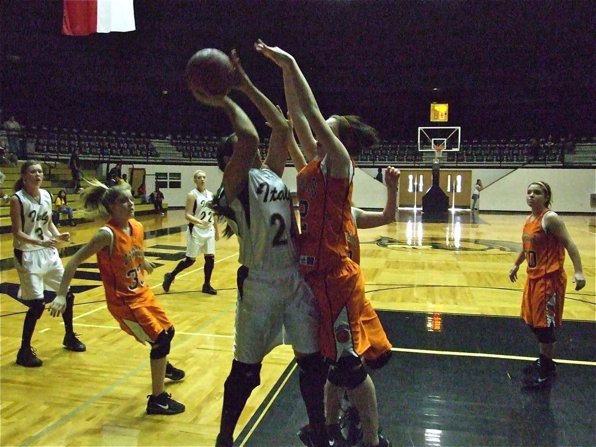 Image: Alyssa shoots inside — Alyssa Richards(24) rises for a shot against Aquilla.