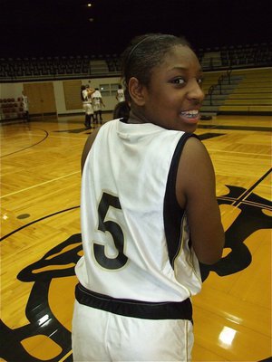 Image: 5 reasons to watch — Jameka Copeland shows off her #5 Lady Gladiator jersey that she plans on making famous. She can dribble, pass, shoot, score and lead…watch out for #5!