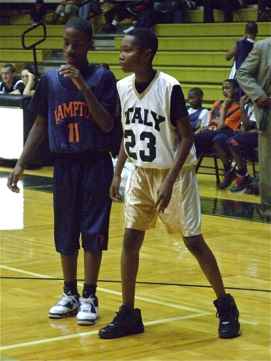 Image: Ready to play — Italy 7th grader Nichlas Cooper(23) and his Gladiator teammates stood their ground against Hampton prep.