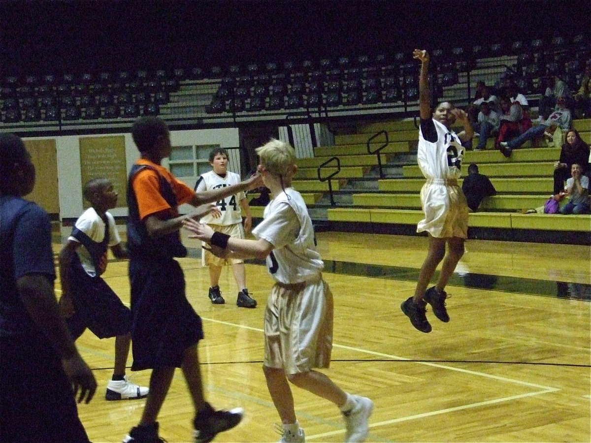 Image: Take that! — The 7th Graders showed no fear as they gave it their best shot against a skilled Hampton Prep team.