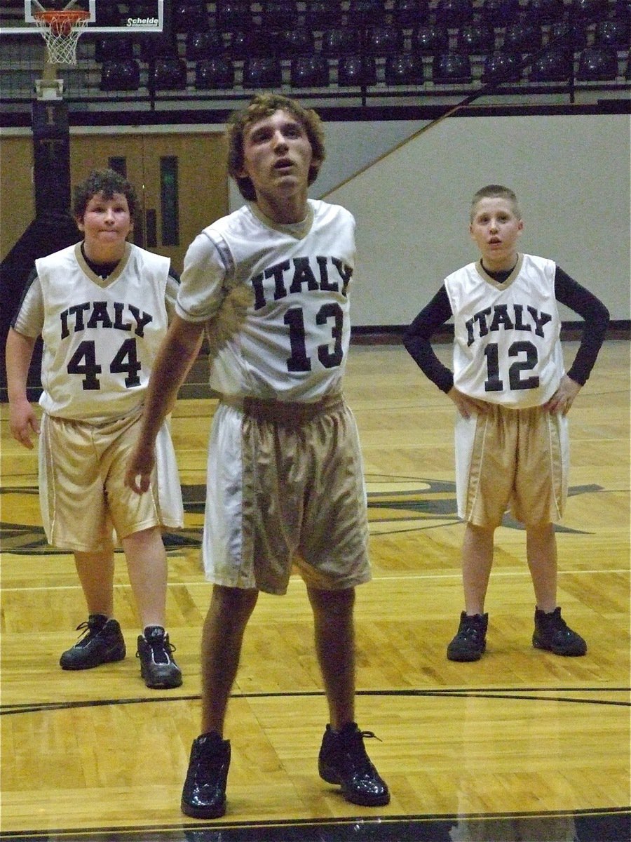 Image: Chace from the line — Chace McGinnis(13) tries his hand from the free throw line.