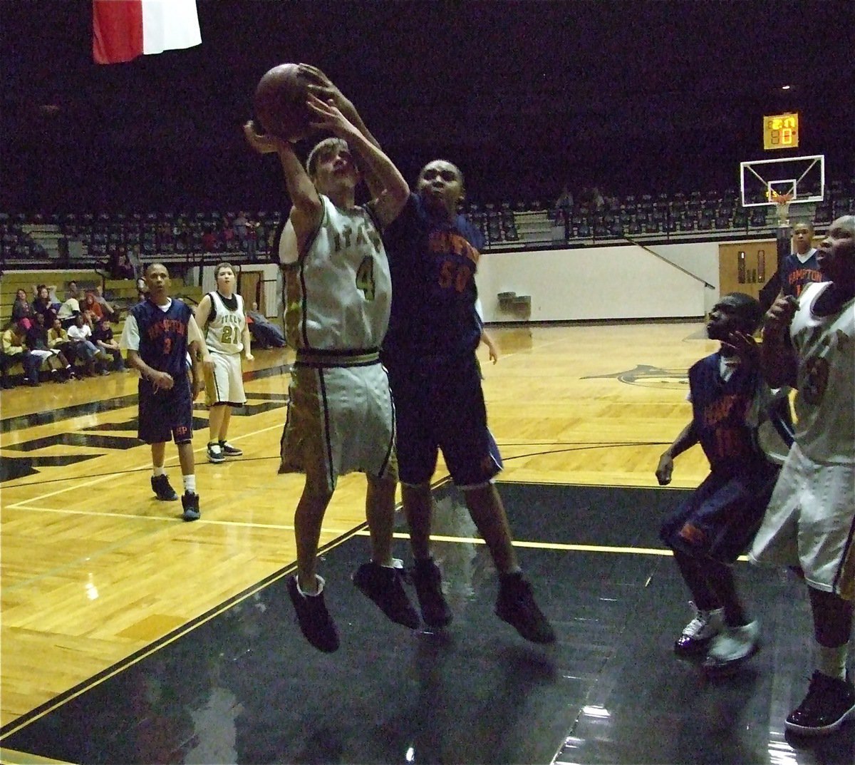 Image: Wood gets fouled — Justin Wood(4) kept attacking eventually earning a trip to the line.