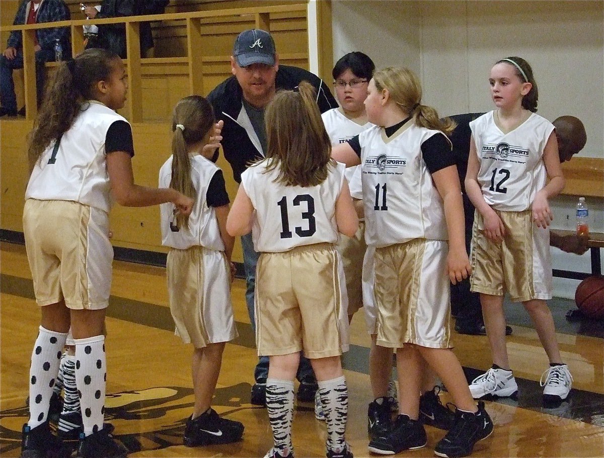 Image: The pep talk — Assistant Coach Allen Richards gives some advice to his Italy 13 girls.