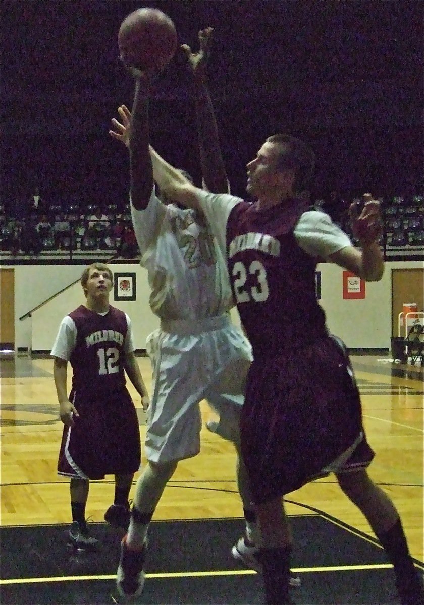 Image: Corrin sneaks in — Italy’s JV Gladiator Corrin Frazier(20) snuck into the paint to score over the Mildred Eagles defense in the Consolation Championship game.