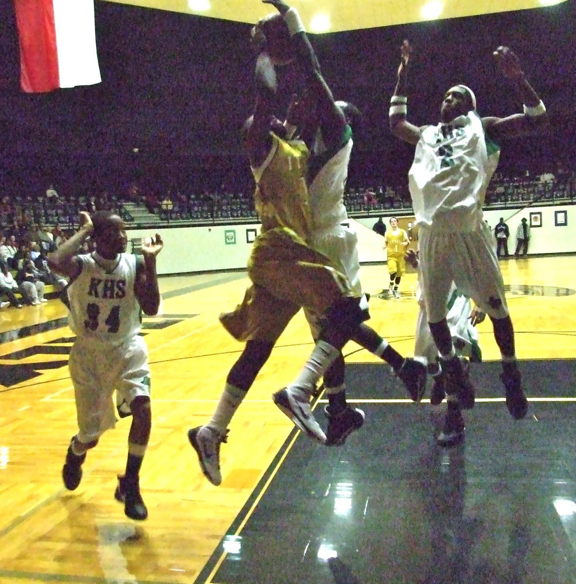 Image: No guts no glory — An attacking Jasenio “Beast” Anderson(11) gets mauled by a Kerens Bobcat.