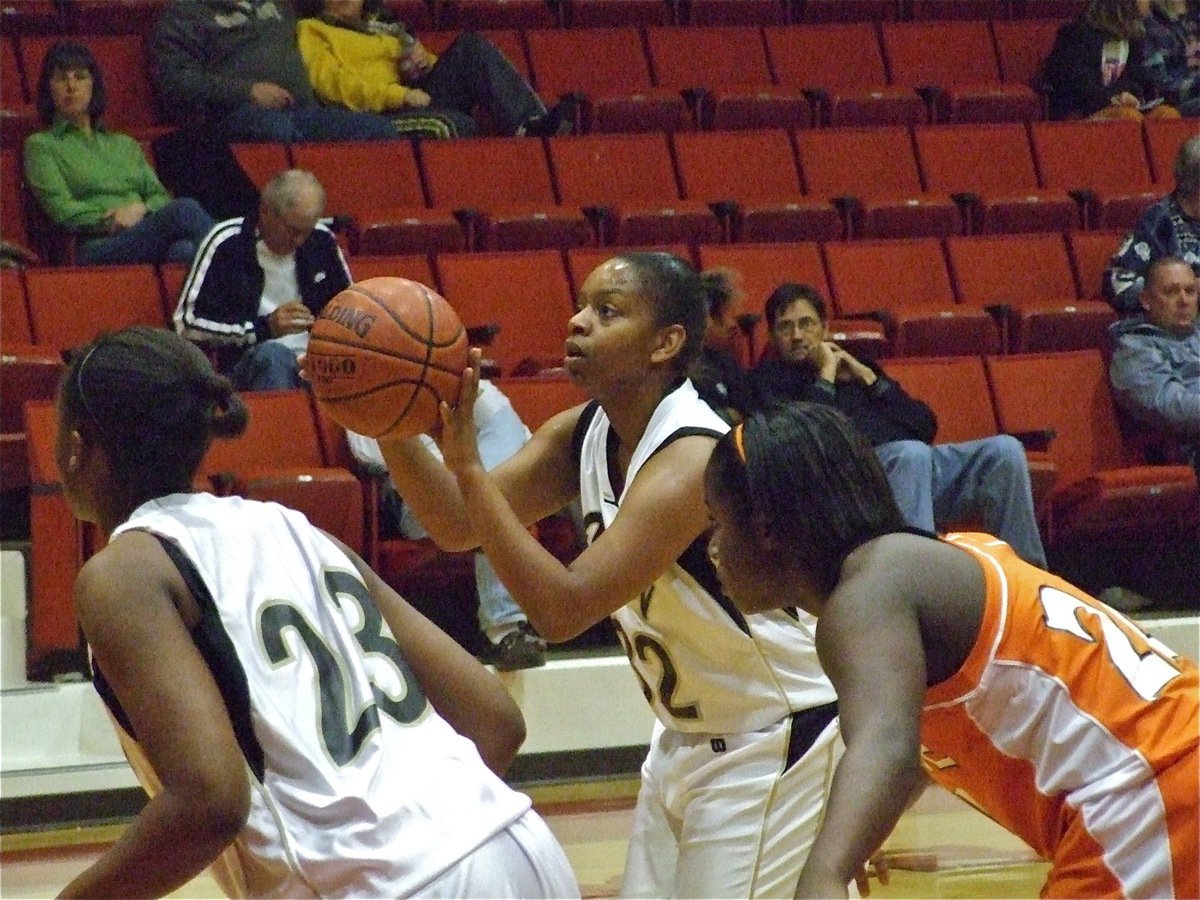 Image: Fleming’s foul shot — Italy’s lone senior, Jaleecia Fleming(32) knocked down free throws.