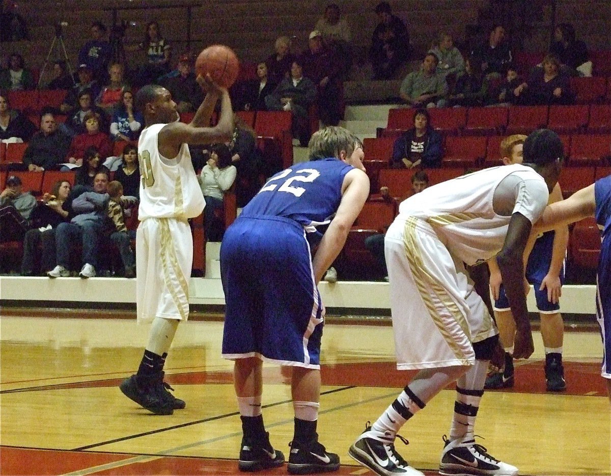 Image: Point made — De’Andre Sephus(20) helps make a statement against the Frost Polar Bears.