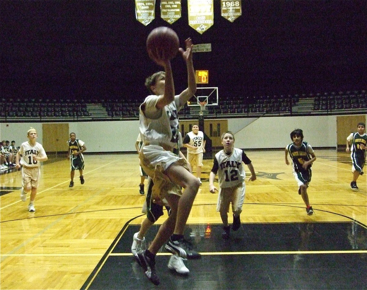 Image: Colton Petrey and the 7th graders take it to Irving North Hills — Italy 7th Grader Colton Petrey (23) puts the final touches on an Italy win over Irving North Hills, 17-11.