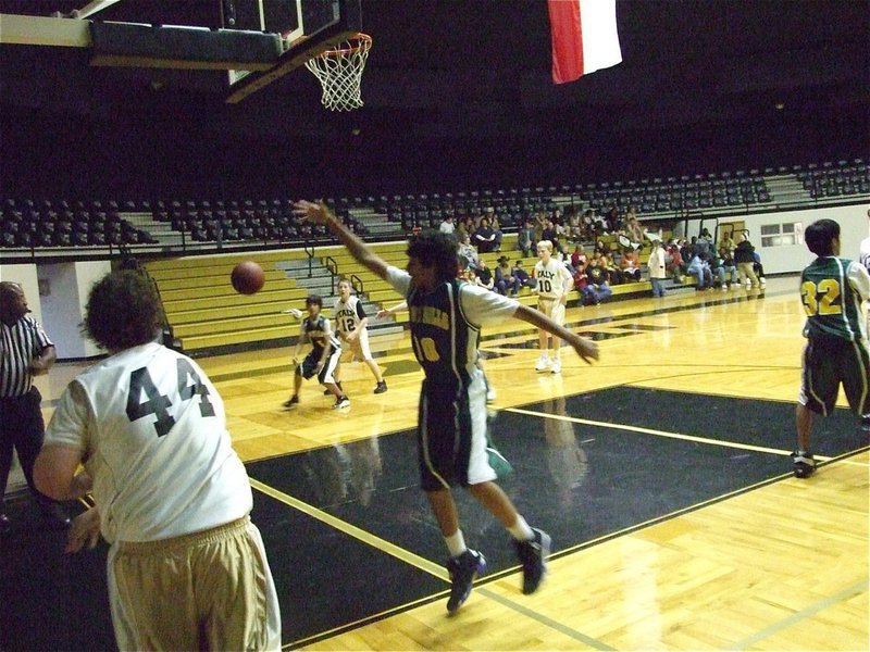 Image: Gunslinger — John Byers(44) shoots a pass in the direction of teammate J.T. Escamilla(12).