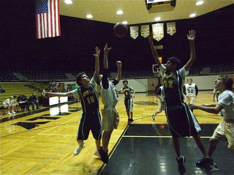 Image: J.T. shoots a jumper — Escamilla gets inside with the trees and takes a shot.