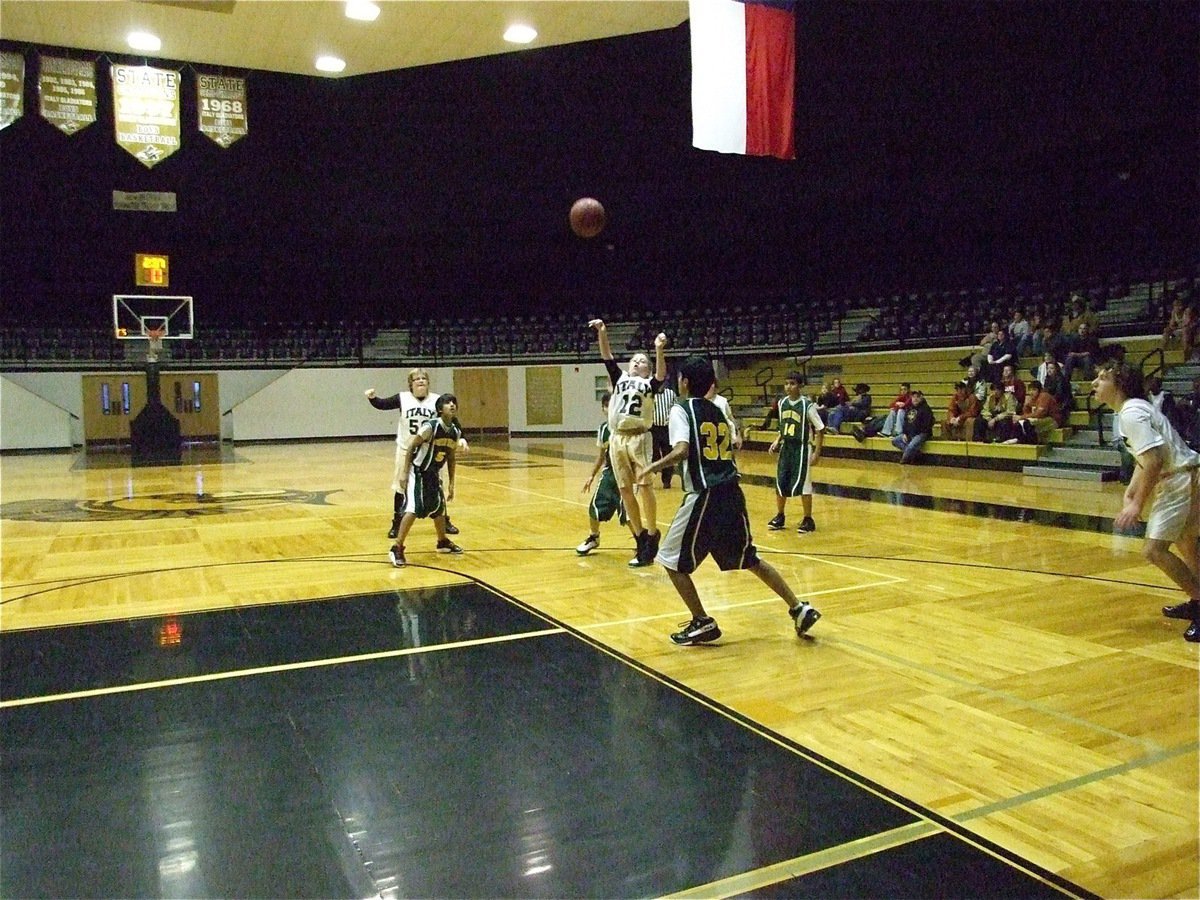 Image: J.T. takes the shot — Escamilla puts up a jumper against Irving North Hills as Italy’s 7th grade team climbs the mountain for their second win of the season, both against INH.