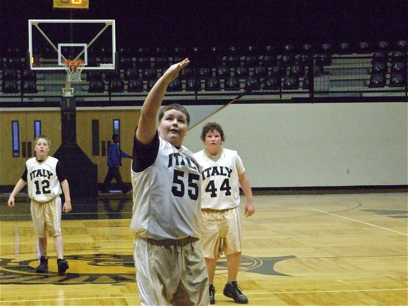 Image: Style points — Kelton Bales tries to curve his shot straight into the hoop.