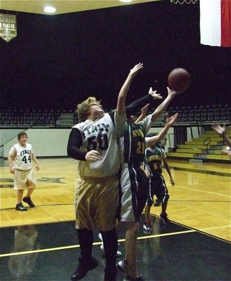 Image: Tyler challenges — Tyler Vencil(50) competes for the rebound.