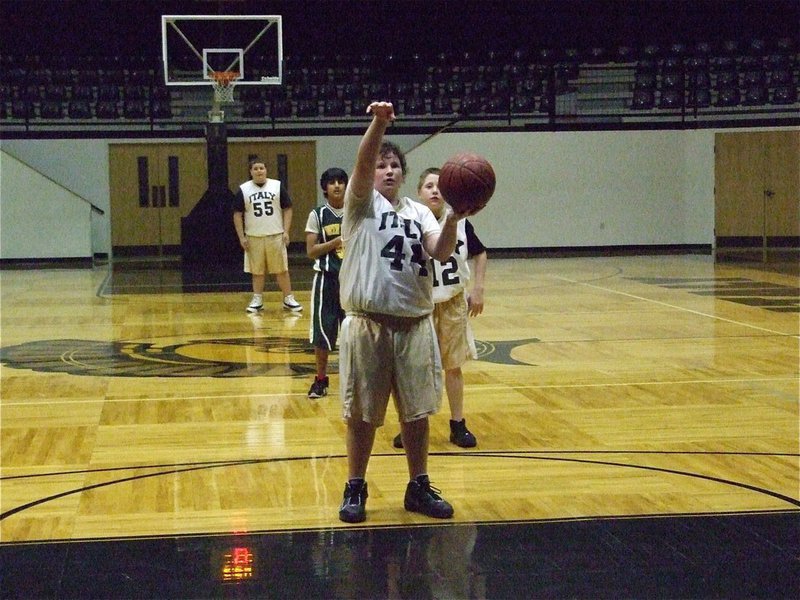 Image: Lining it up — John Byers(44) lines up his free shot.