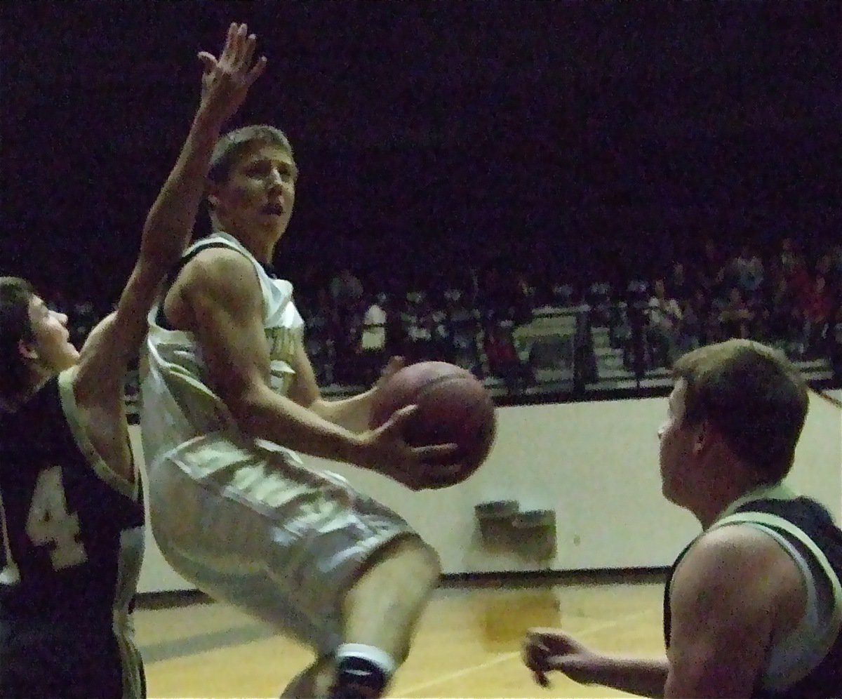 Image: Kyle climbs high — Kyle Jackson floats toward the goal.