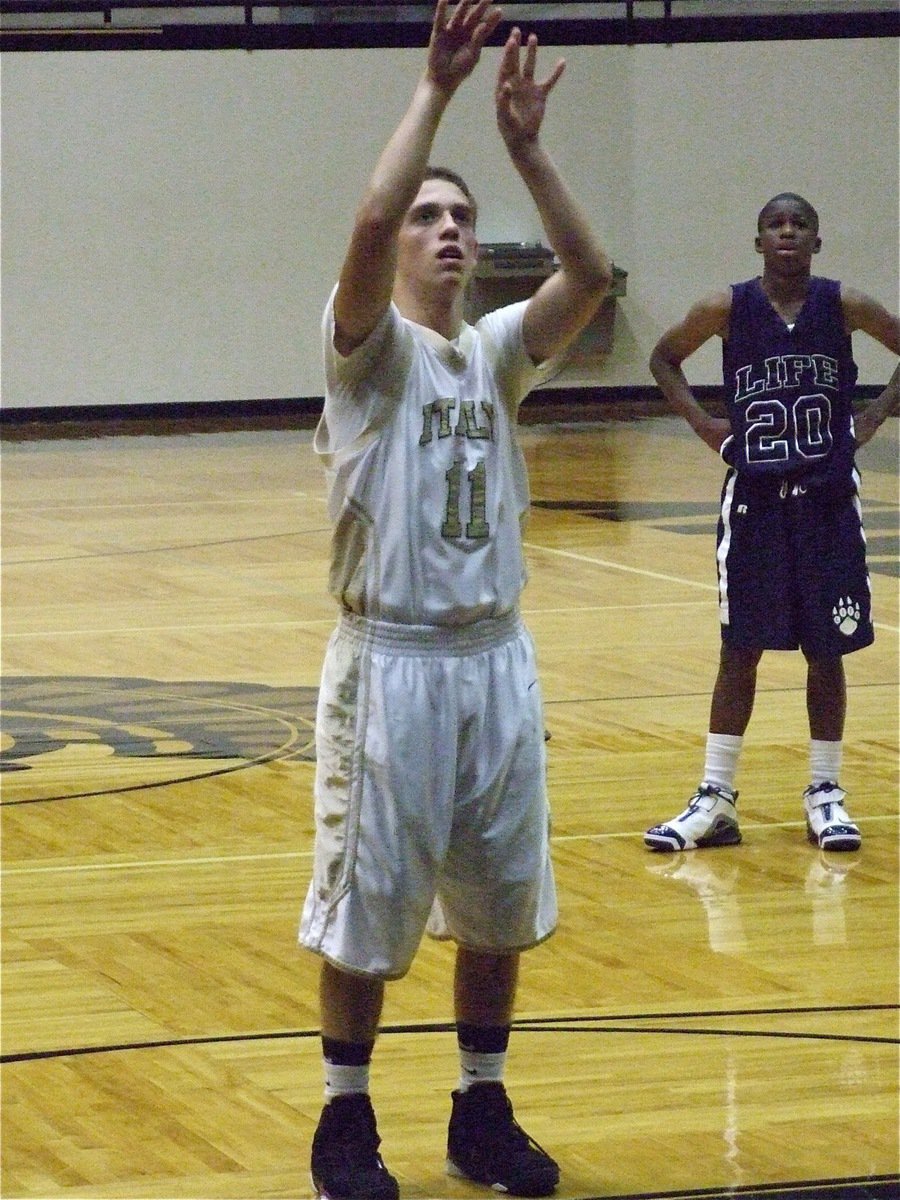 Image: Souder from the stripe — Italy JV Gladiator Brandon Souder(11) hits one of his 3-points to take the life out of the Lions.