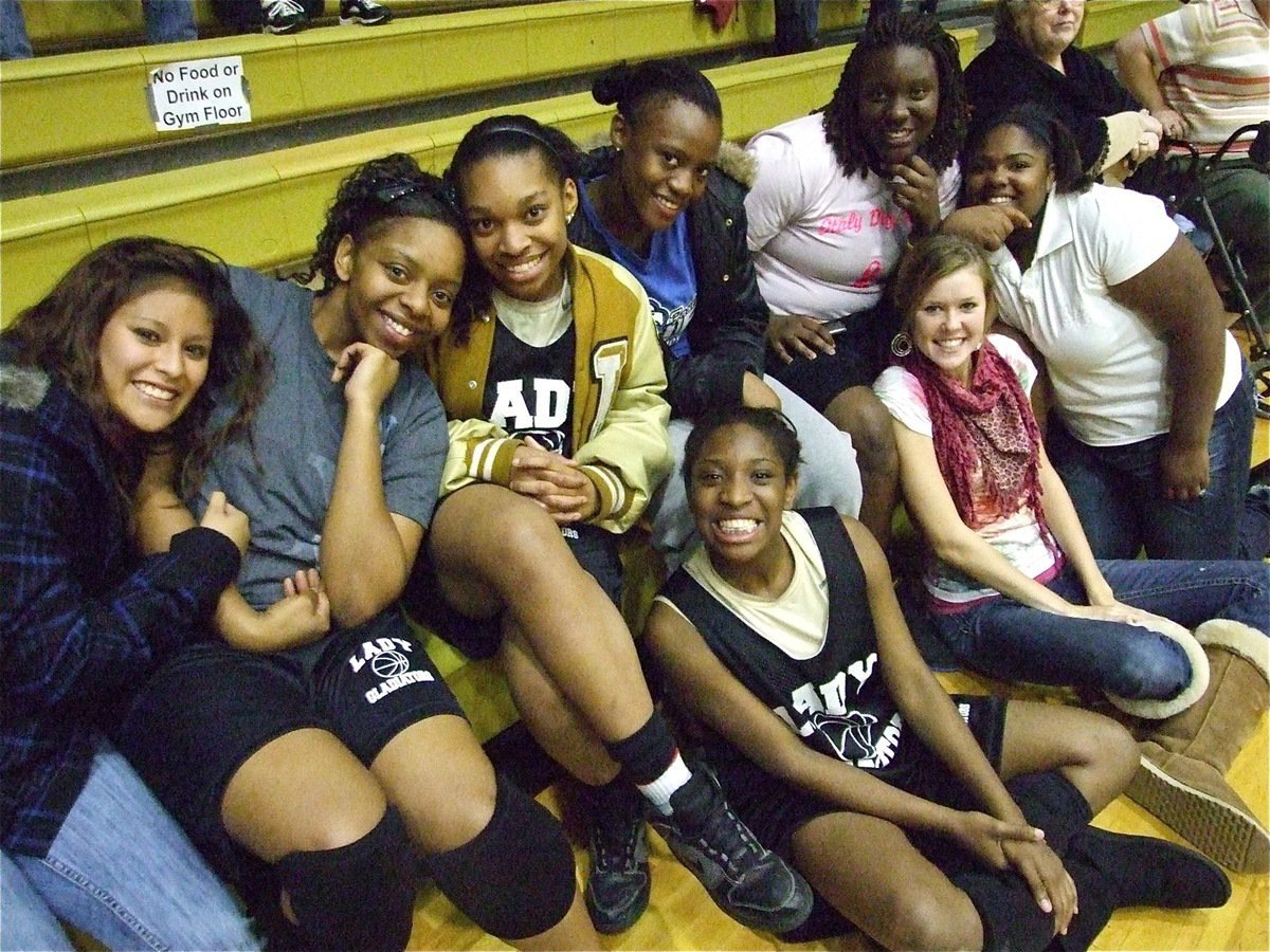 Image: Cheering Courtside — Don’t they look sweet and innocent just sitting there minding their own business.