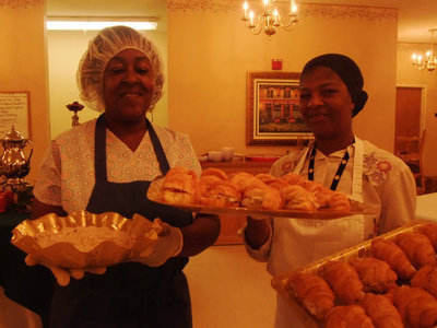 Image: Sandwiches Anyone? — These two wonderful ladies were working hard in the kitchen to create the wonderful food.