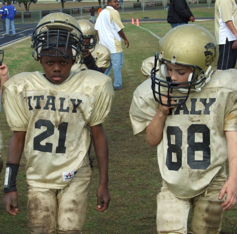 Image: Start the celebration — Taron Smith(21) and Corbin Schrotke(88) helped their B-Team finish as 9-0 Superbowl Champions.