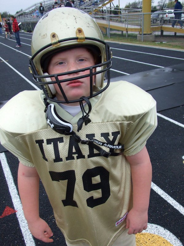 Image: Levi is a Champion — Levi Stark(79) and his IYAA C-Team teammates were ready to win the Superbowl over the Palmer Bulldogs.