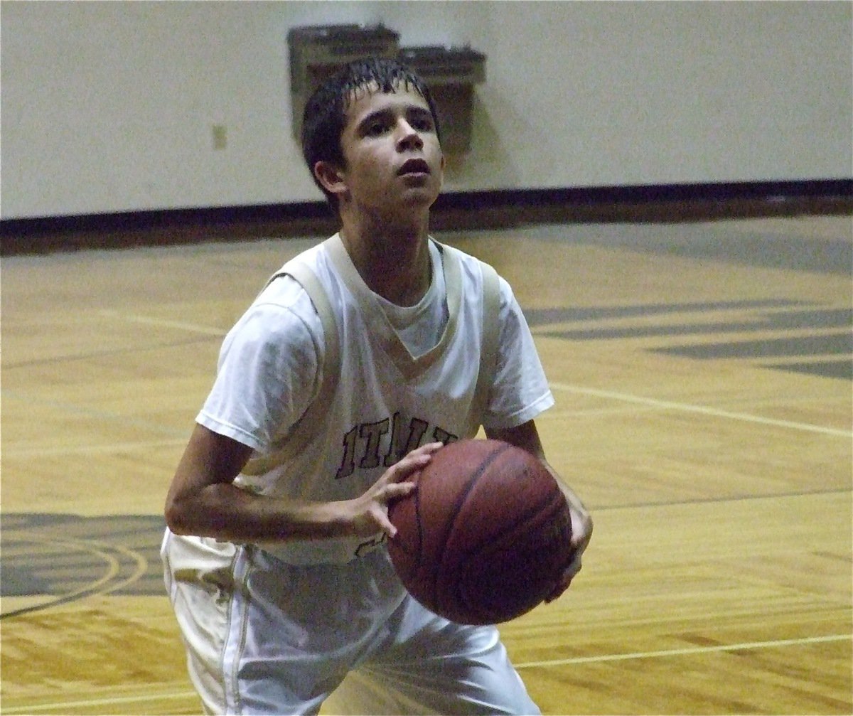 Image: Caden on the line — Caden Jacinto knocks down a free throw.