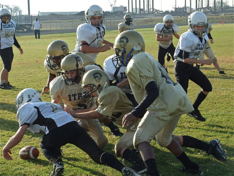 Image: Safety! — Palmer’s quarterback falls on the fumble as Italy’s A-Team defense tackles him for a safety to take an 8-7 lead over the Bulldogs.