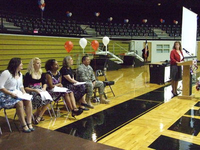 Image: The program begins — Ms. Tanya Parker, IHS Principal, introduces her guests for the program.