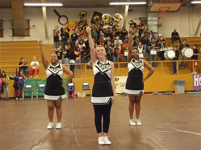 Image: A victory sounds good! — Destani, Lexie and Jaleecia lead a cheer during the Pep Rally as the Gladiator Regiment Band had their back.