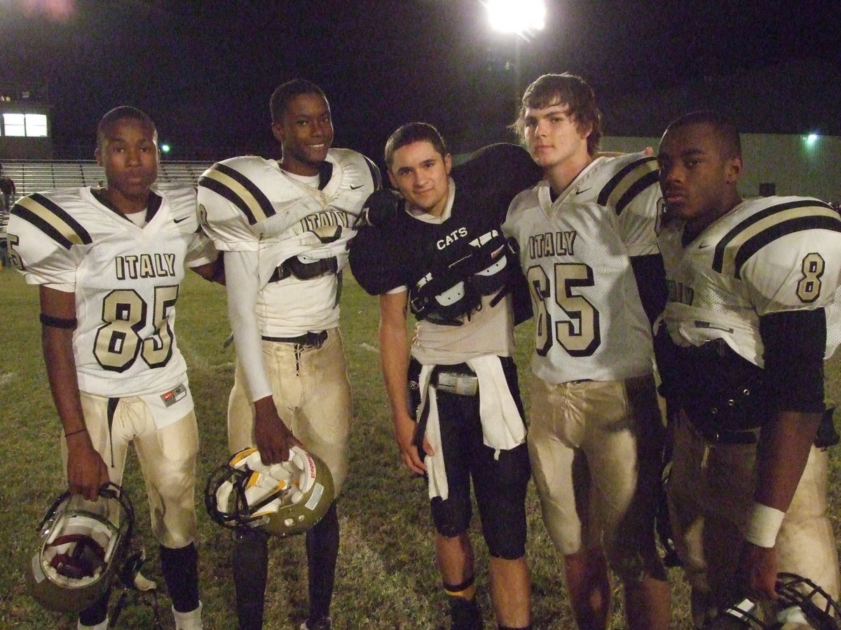 Image: Still friends — Itasca’s Gregory Mason(13) and our boys Tavarus Griffin(85), Aaron Thomas(9), Jonothan Nash(65) and Desmond Anderson(8) are still friends long after the battle is over.