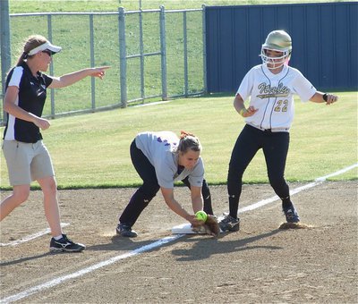 Image: Megan triples — Stay! Italy head coach Jennifer Reeves directs Megan Richards to stay on the third base bag after Richards tripled to score 1 run against Tolar Friday in the top of the 1st inning.