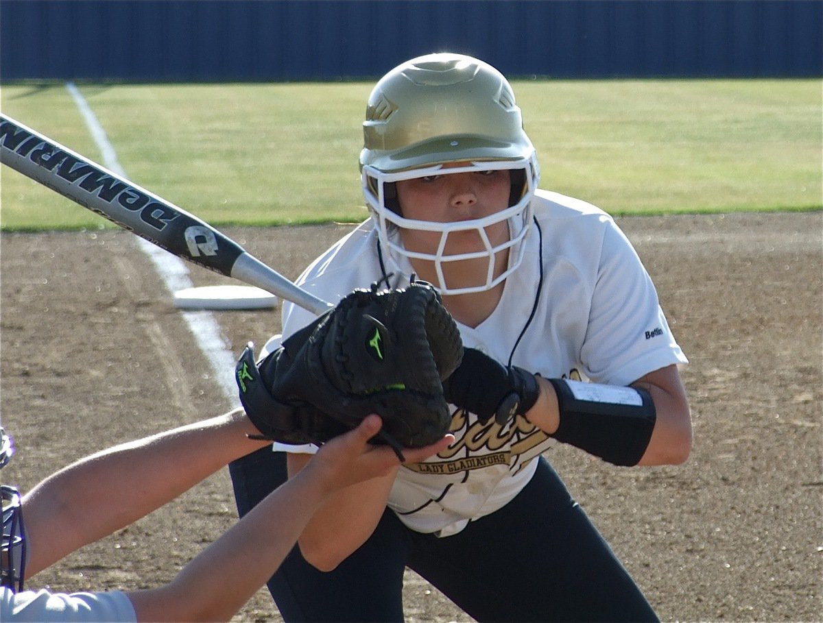 Image: Good eyes — Senior slugger Cori Jeffords watches the ball all the way into the catchers mitt.