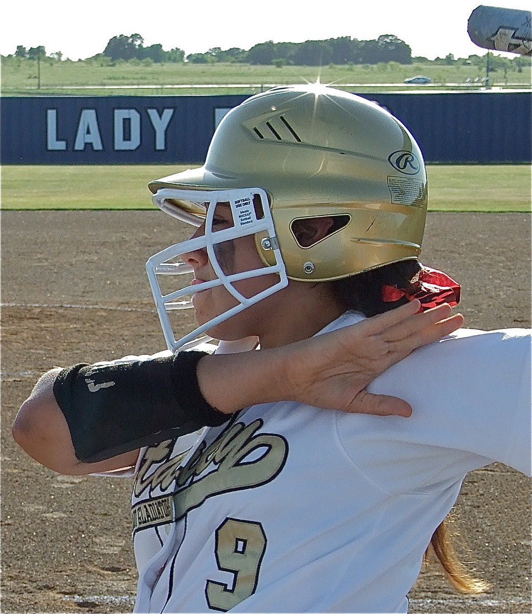 Image: The chosen one — Alyssa Richards has been blessed by the softball gods as she prepares to hit one toward the heavens.