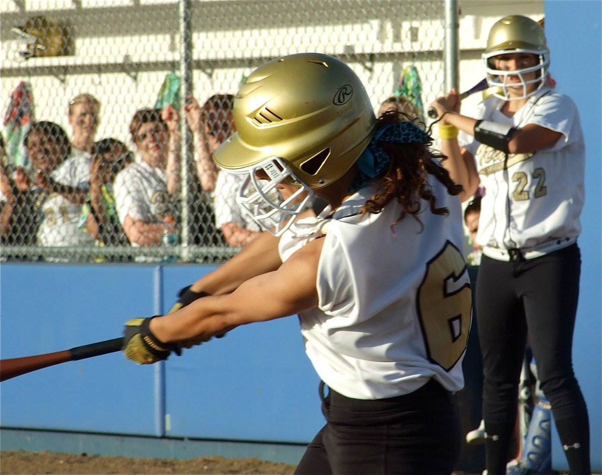 Image: Viers drives — Anna Viers powers a grounder past Tolar’s infield.