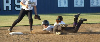 Image: Out at second! — Italy’s shortstop Anna Viers dives for a tag to keep the Tolar Lady Rattlers from slithering to 2nd base in game one.