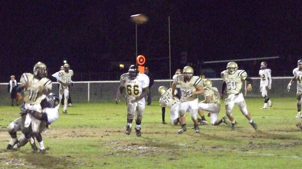 Image: Anderson makes a play — Italy quarterback Jasenio Anderson(11) got the pass away before being sacked.