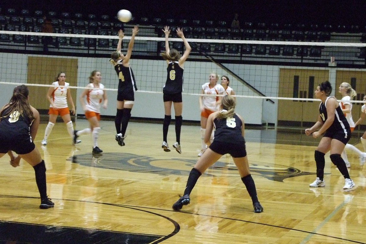 Image: Avalon vs Lady Gladiators — Drew Windham and Kaitlin Rossa get it over the net.