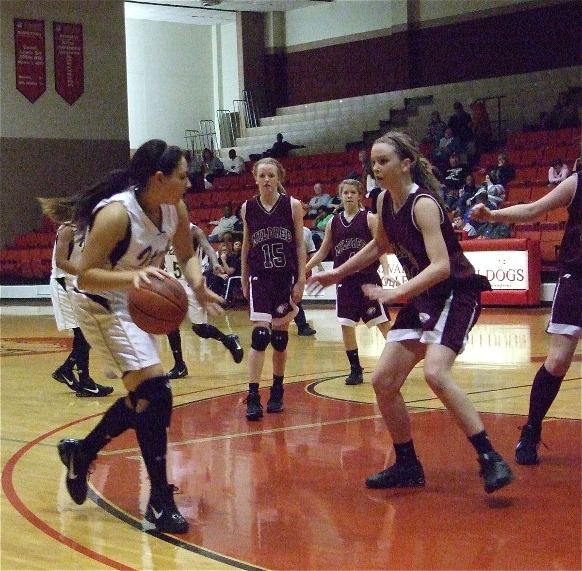 Image: Alyssa on the move — Alyssa Richards(24) tries to go baseline against Mildred’s defense.