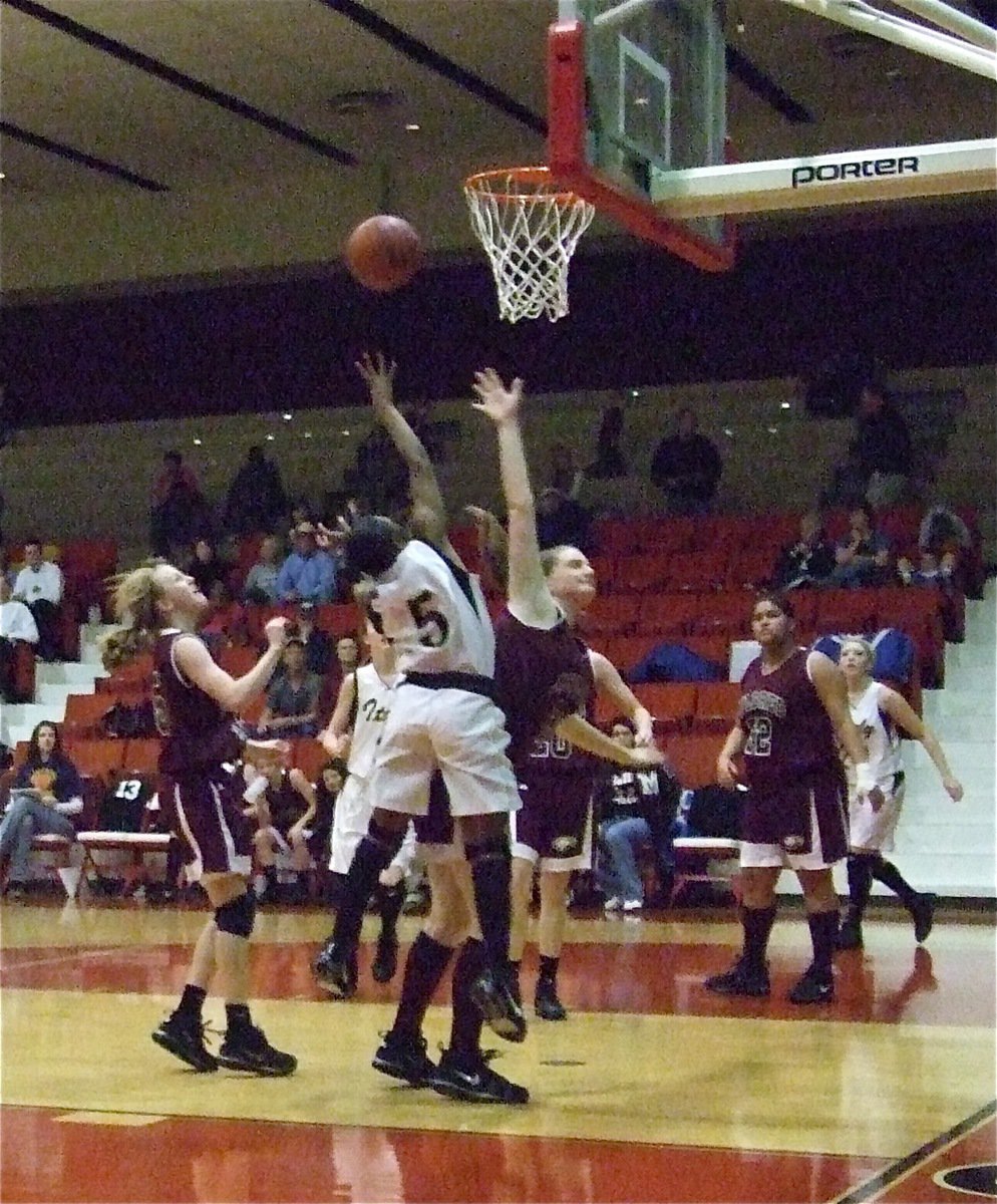 Image: Copeland scores — Jameka Copeland(5) reaches for 2-points.