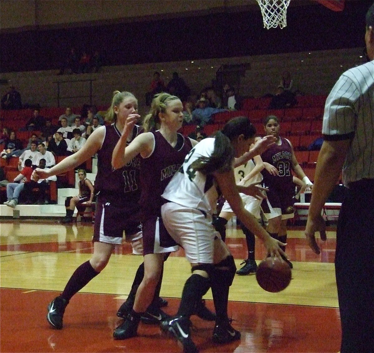 Image: Baseline drive  — Alyssa Richards(24) powers her way toward the basket.